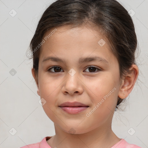 Joyful white child female with medium  brown hair and brown eyes