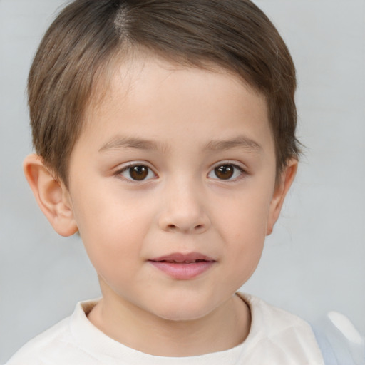 Joyful white child male with short  brown hair and brown eyes