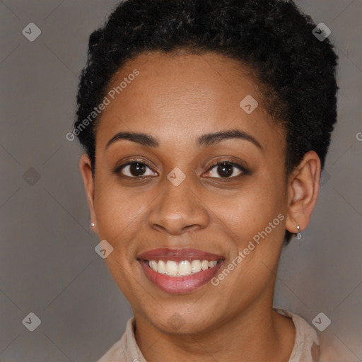 Joyful black young-adult female with short  brown hair and brown eyes