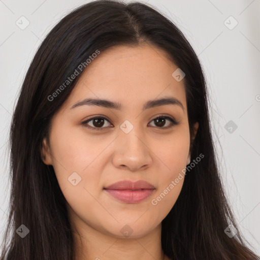 Joyful latino young-adult female with long  brown hair and brown eyes