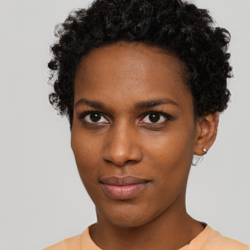 Neutral black young-adult female with short  brown hair and brown eyes