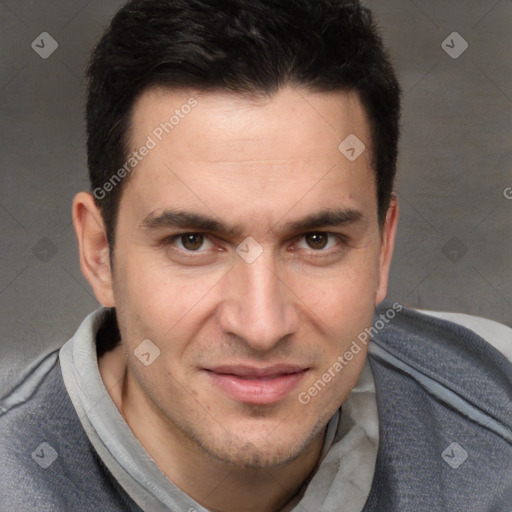 Joyful white adult male with short  brown hair and brown eyes