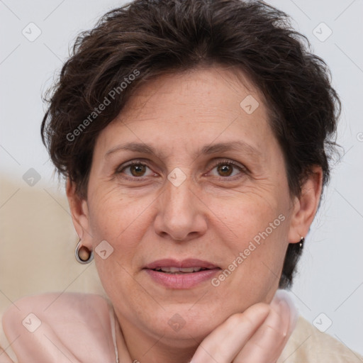 Joyful white adult female with short  brown hair and brown eyes