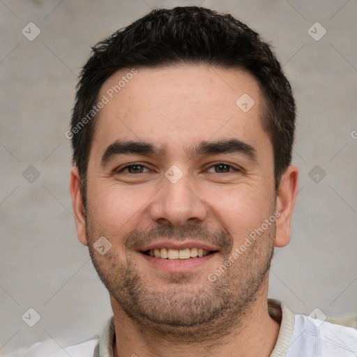 Joyful white young-adult male with short  black hair and brown eyes