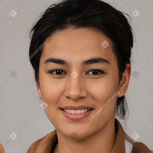 Joyful asian young-adult female with medium  brown hair and brown eyes