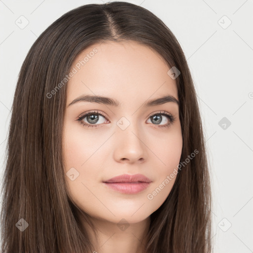 Neutral white young-adult female with long  brown hair and brown eyes