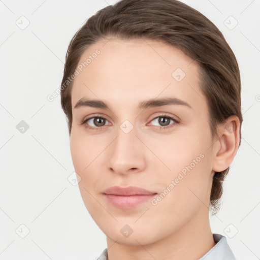 Neutral white young-adult female with short  brown hair and brown eyes