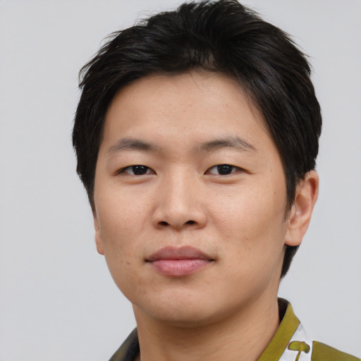 Neutral asian young-adult male with short  brown hair and brown eyes