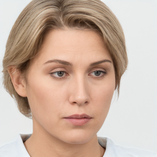 Neutral white young-adult female with medium  brown hair and grey eyes