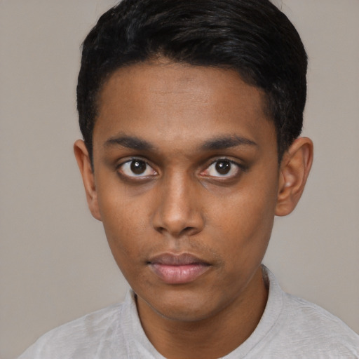 Neutral latino young-adult male with short  black hair and brown eyes