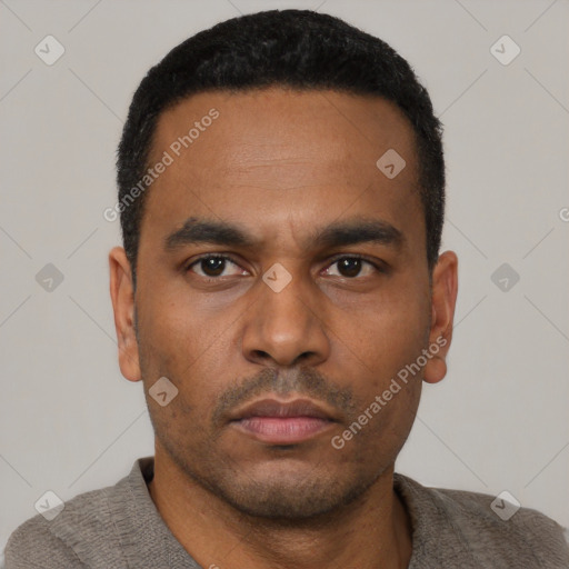 Neutral latino young-adult male with short  black hair and brown eyes