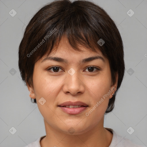 Joyful asian young-adult female with medium  brown hair and brown eyes