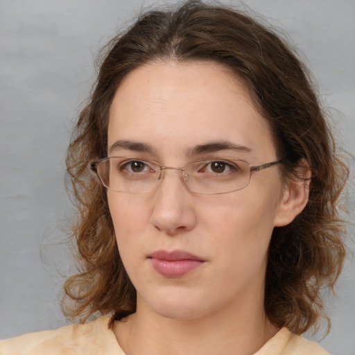 Neutral white adult female with medium  brown hair and brown eyes