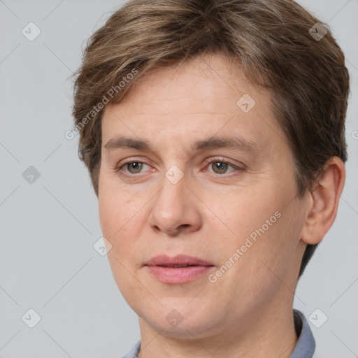 Joyful white adult male with short  brown hair and grey eyes