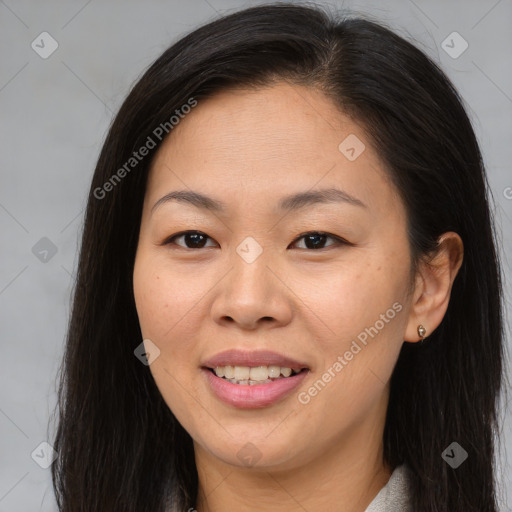 Joyful asian young-adult female with long  brown hair and brown eyes