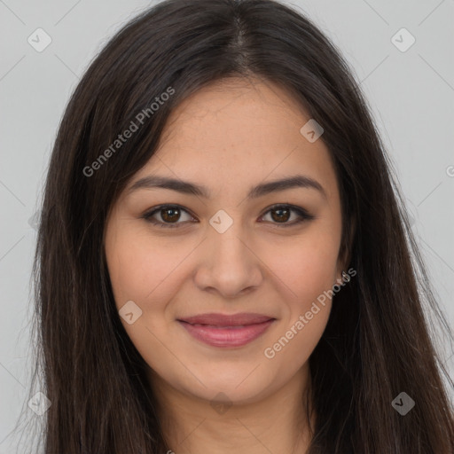 Joyful latino young-adult female with long  brown hair and brown eyes