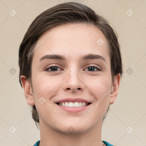 Joyful white young-adult female with short  brown hair and grey eyes