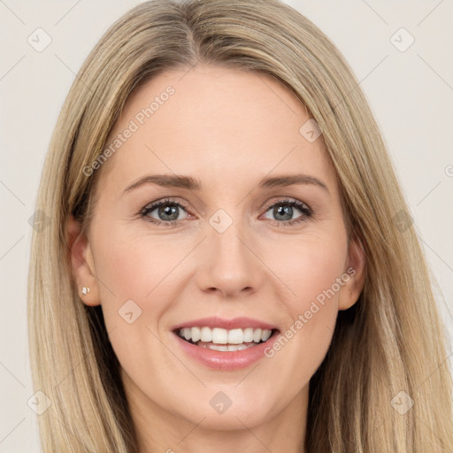 Joyful white young-adult female with long  brown hair and green eyes