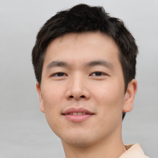 Neutral asian young-adult male with short  brown hair and brown eyes