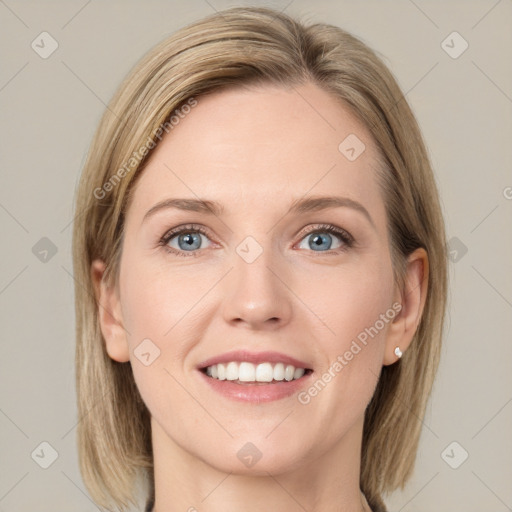 Joyful white young-adult female with long  brown hair and green eyes