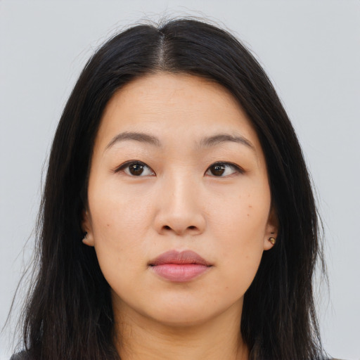 Neutral asian young-adult female with long  brown hair and brown eyes