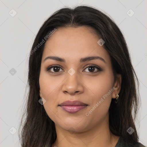 Joyful latino young-adult female with long  brown hair and brown eyes