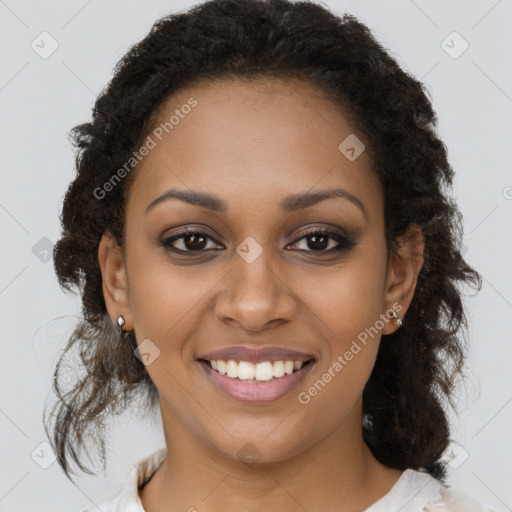 Joyful black young-adult female with medium  brown hair and brown eyes