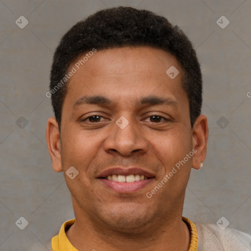 Joyful latino young-adult male with short  brown hair and brown eyes
