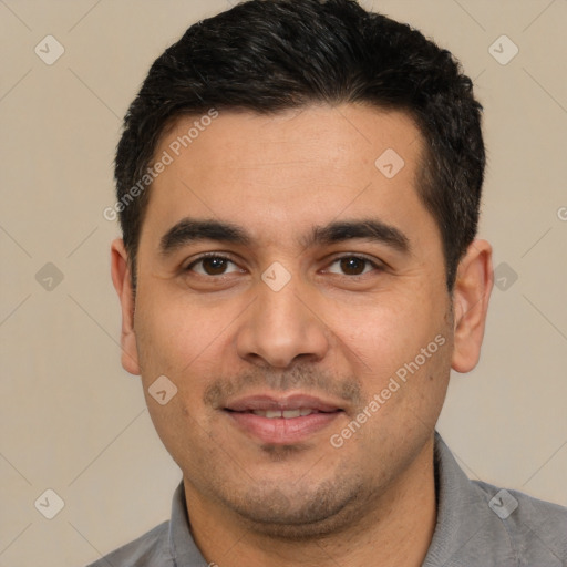 Joyful white young-adult male with short  black hair and brown eyes