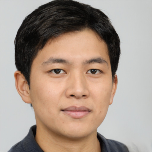 Neutral asian young-adult male with short  brown hair and brown eyes