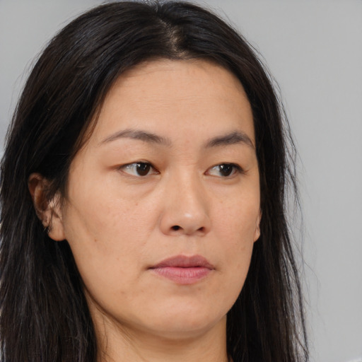 Neutral asian young-adult female with long  brown hair and brown eyes