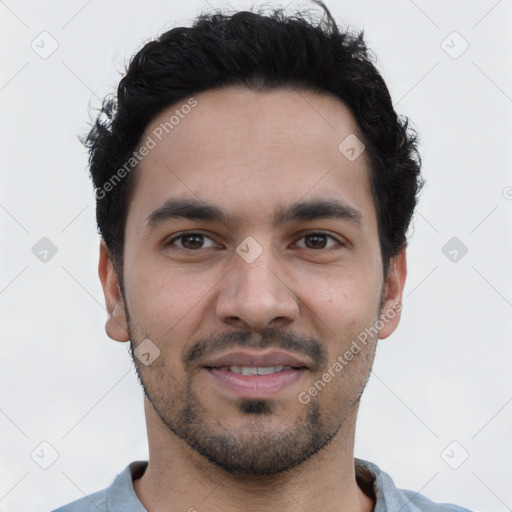 Joyful white young-adult male with short  black hair and brown eyes