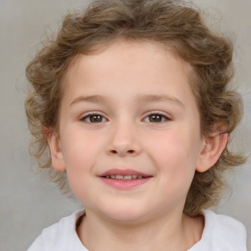 Joyful white child female with medium  brown hair and brown eyes