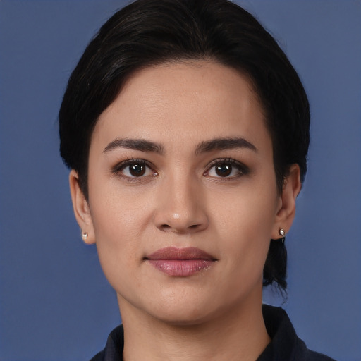 Joyful white young-adult female with short  black hair and brown eyes