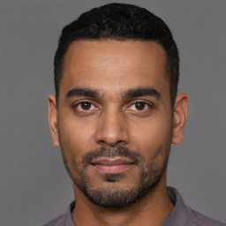Neutral latino young-adult male with short  black hair and brown eyes