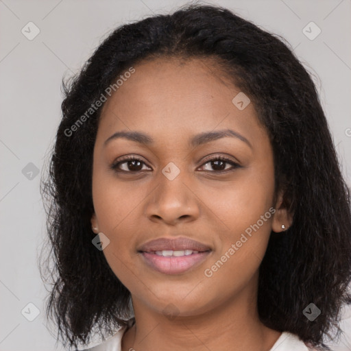 Joyful black young-adult female with medium  black hair and brown eyes