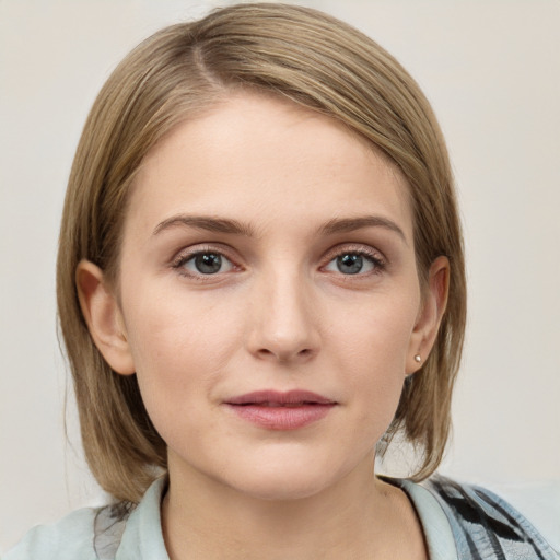 Neutral white young-adult female with medium  brown hair and blue eyes