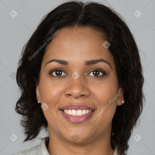 Joyful black young-adult female with medium  brown hair and brown eyes