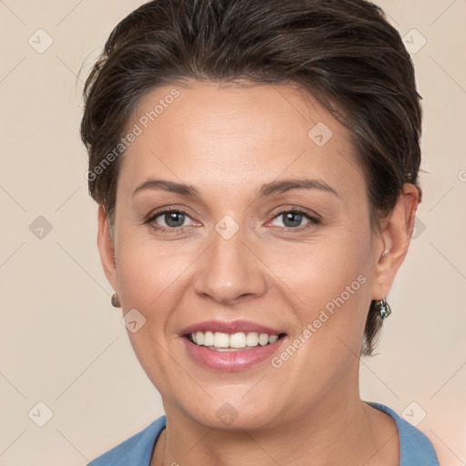 Joyful white adult female with short  brown hair and brown eyes