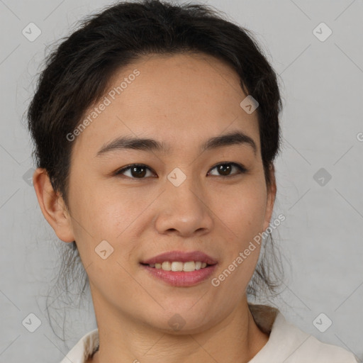 Joyful latino young-adult female with short  brown hair and brown eyes