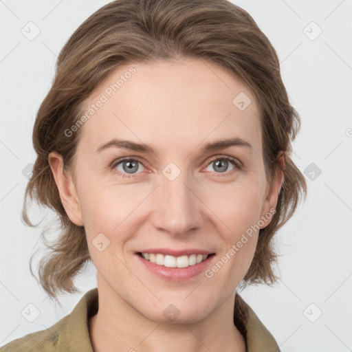 Joyful white young-adult female with medium  brown hair and grey eyes