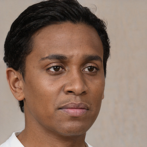 Neutral black young-adult male with short  brown hair and brown eyes