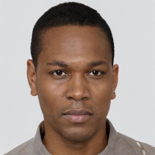 Neutral black young-adult male with short  black hair and brown eyes