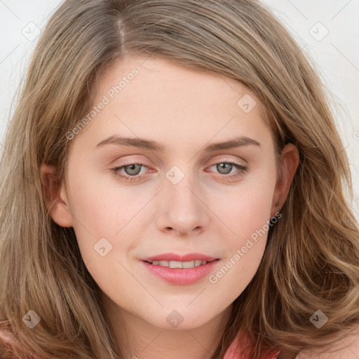 Joyful white young-adult female with long  brown hair and blue eyes