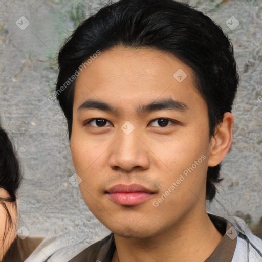 Neutral asian young-adult male with short  black hair and brown eyes