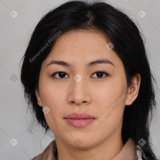 Joyful asian young-adult female with medium  brown hair and brown eyes