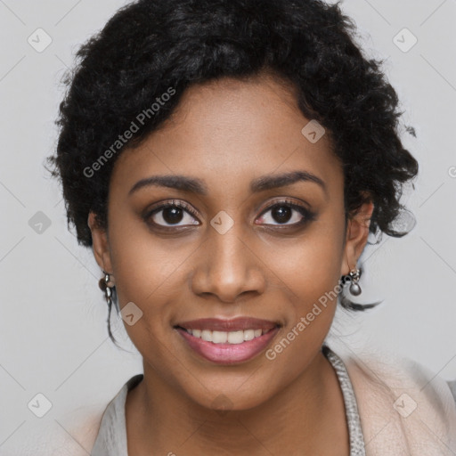 Joyful black young-adult female with short  black hair and brown eyes