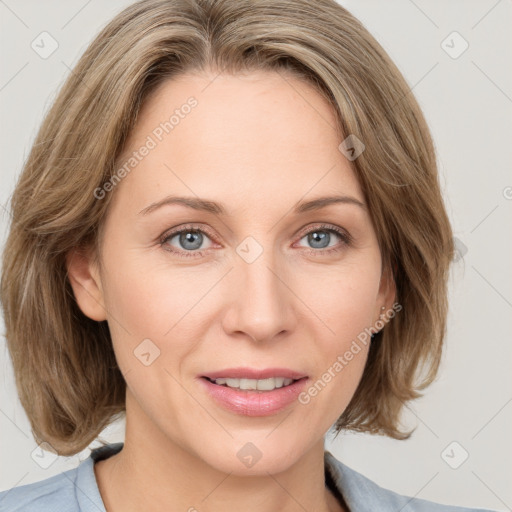 Joyful white young-adult female with medium  brown hair and blue eyes