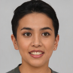 Joyful asian young-adult female with short  brown hair and brown eyes