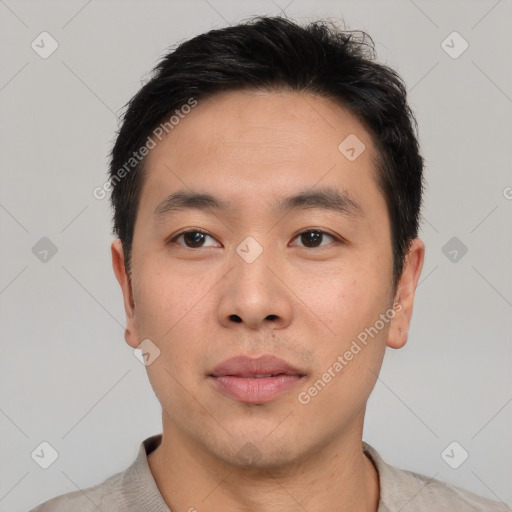 Neutral asian young-adult male with short  brown hair and brown eyes